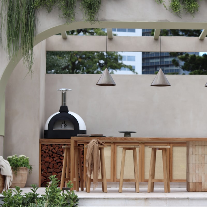 Back patio, pergola and outdoor kitchen after cleaning